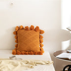The Rowan Tassel Knit Pillow